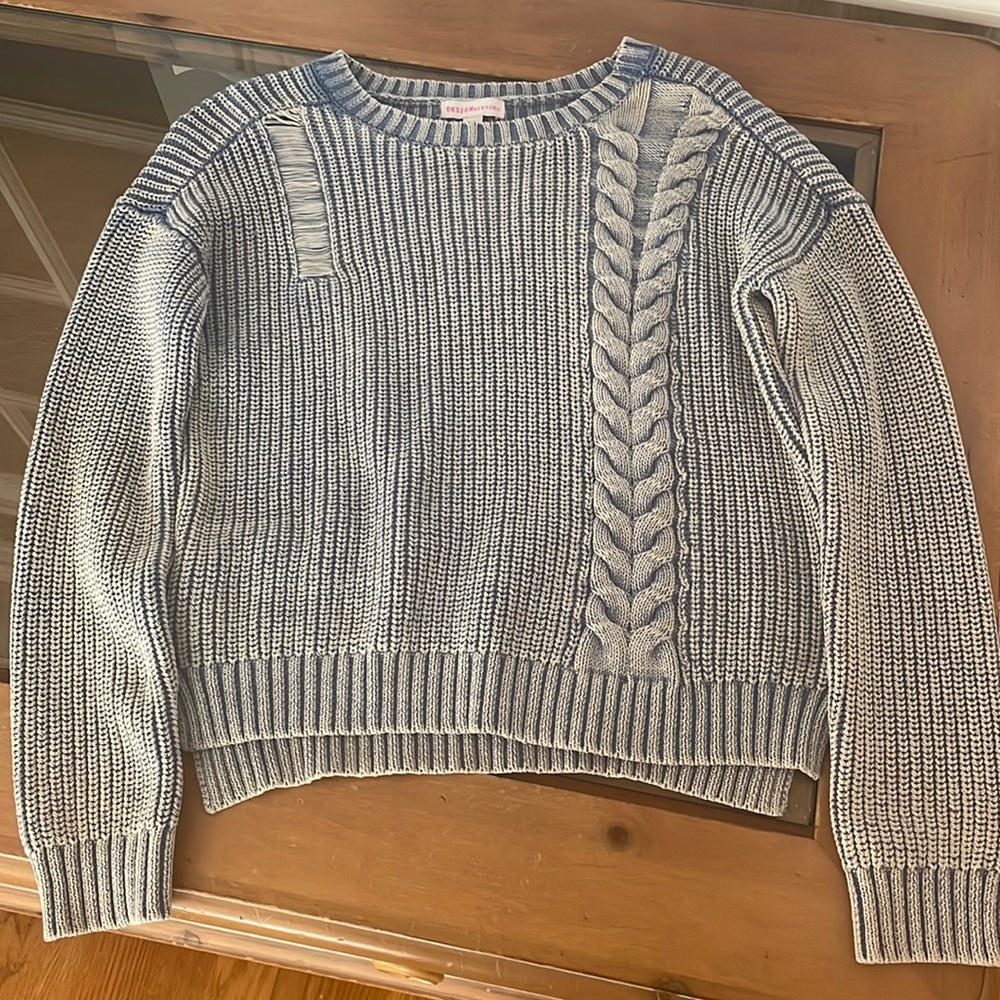 High end designer sweater.